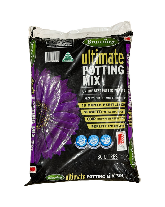 Bag of Brunnings Ultimate Potting Mix with purple flower illustration on a white background