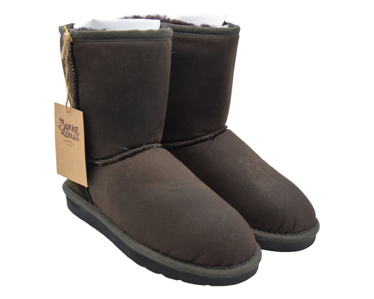 Pair of brown suede boots with a visible brand tag on a white background